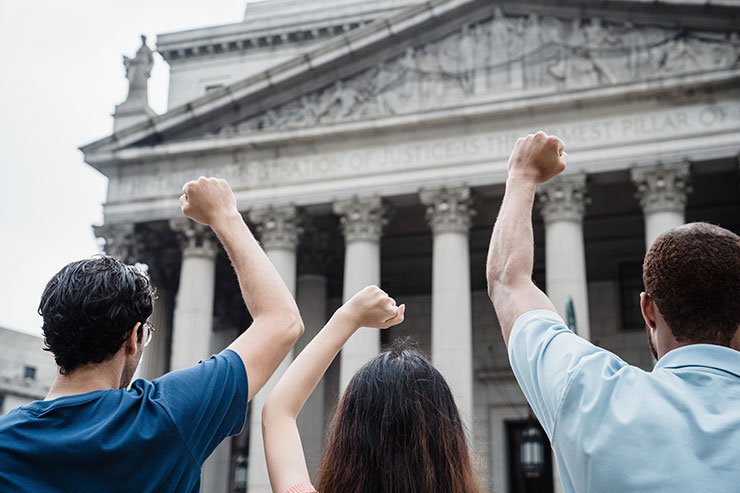 raised fists at Supreme court